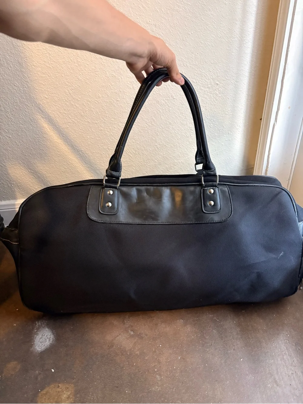 Nike Black Duffel Bag with Red Logo Accent